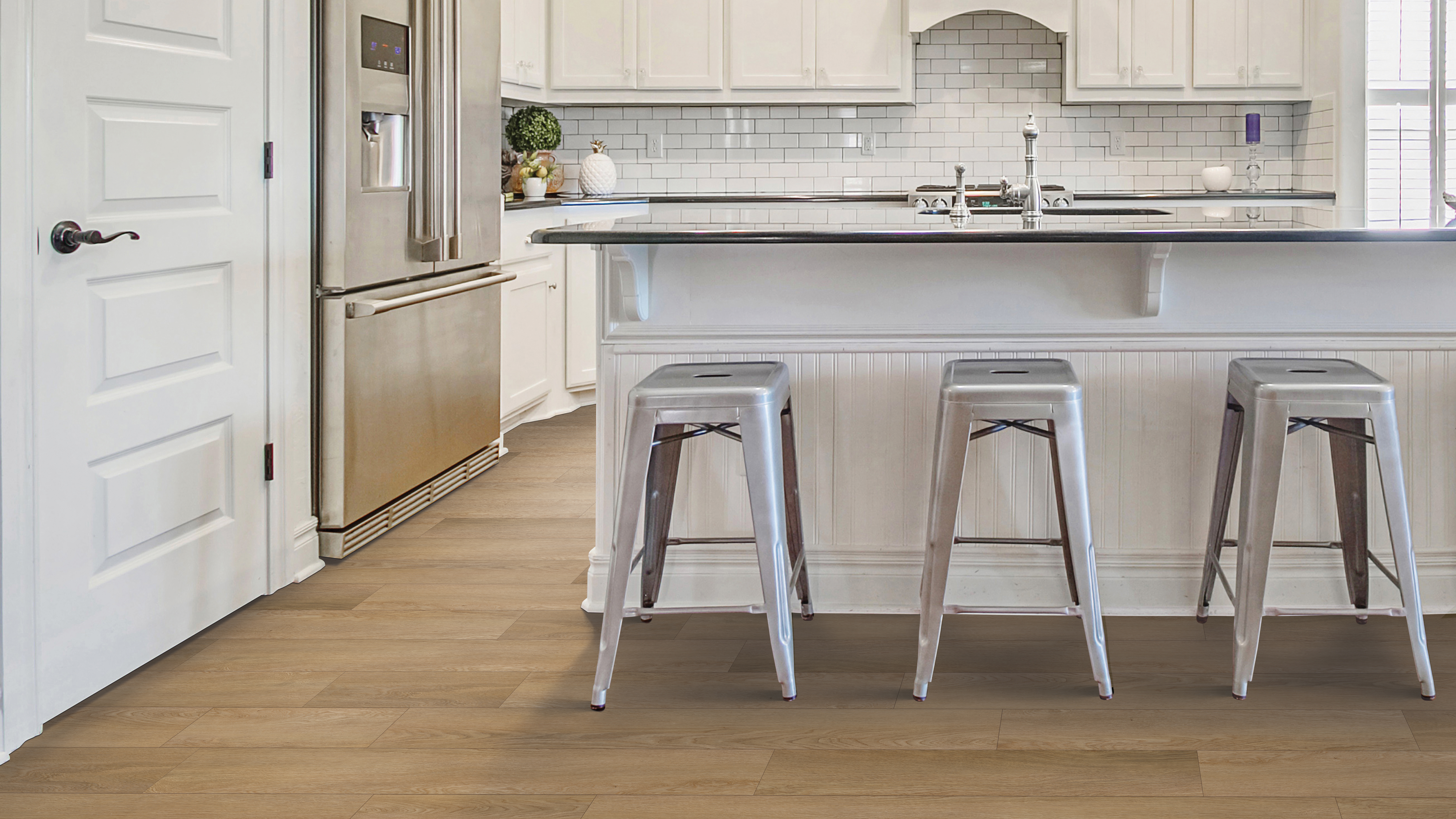 Downs LVT in kitchen featuring modern island and bar stools.